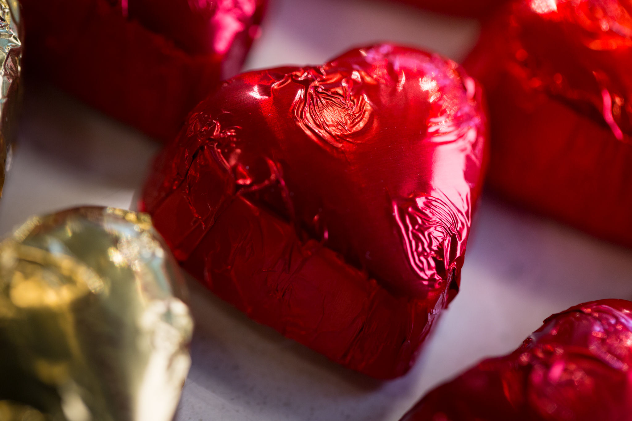 Coeur -hazelnut praline covered in white chocolate