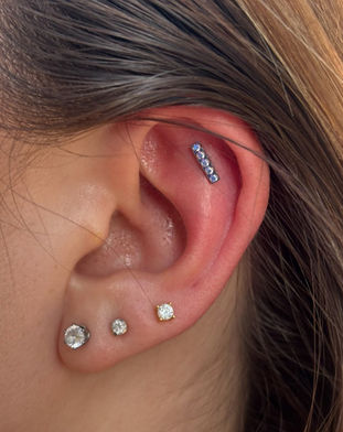 artistic ear curation with multiple diamond ear studs from paramount in fort worthartistic ear curation with multiple diamond ear studs from paramount in fort worth