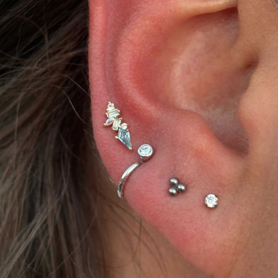 A wide selection of jewelry on ear lobes done by our fort worth based piercer