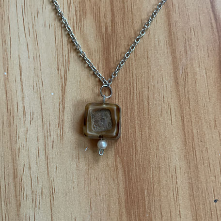 necklace with a bead and pearl pendant 