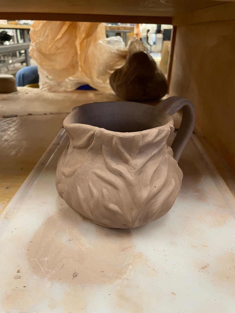 Lettuce Pitcher unglazed