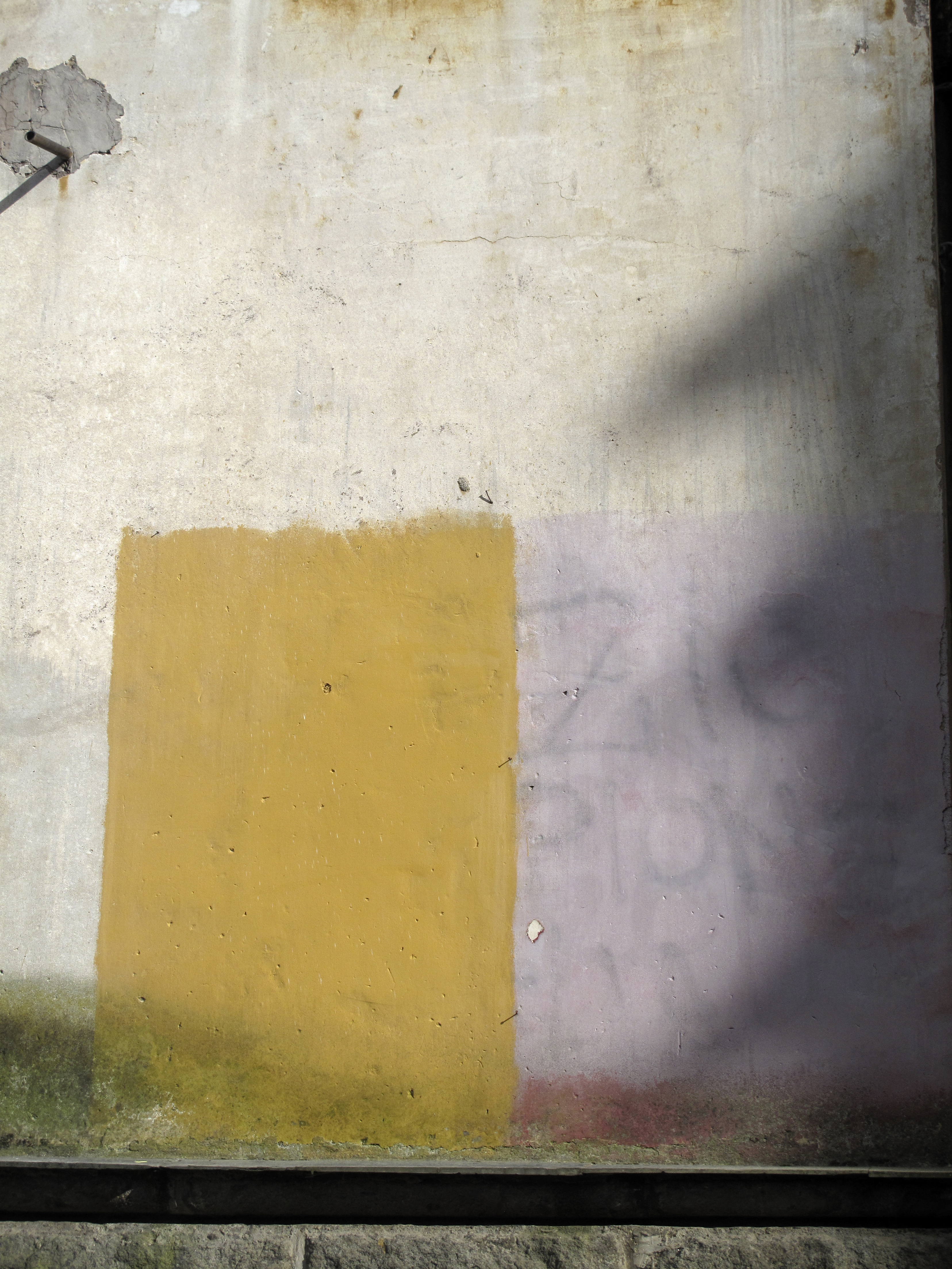 Yellow rectngle on wall, Rome, Italy