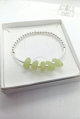 Cultured seaglass stretch bracelet with sterling silver beads.