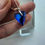 Thumbnail: Blue crystal glass geart earrings on sterling silver lever backs.