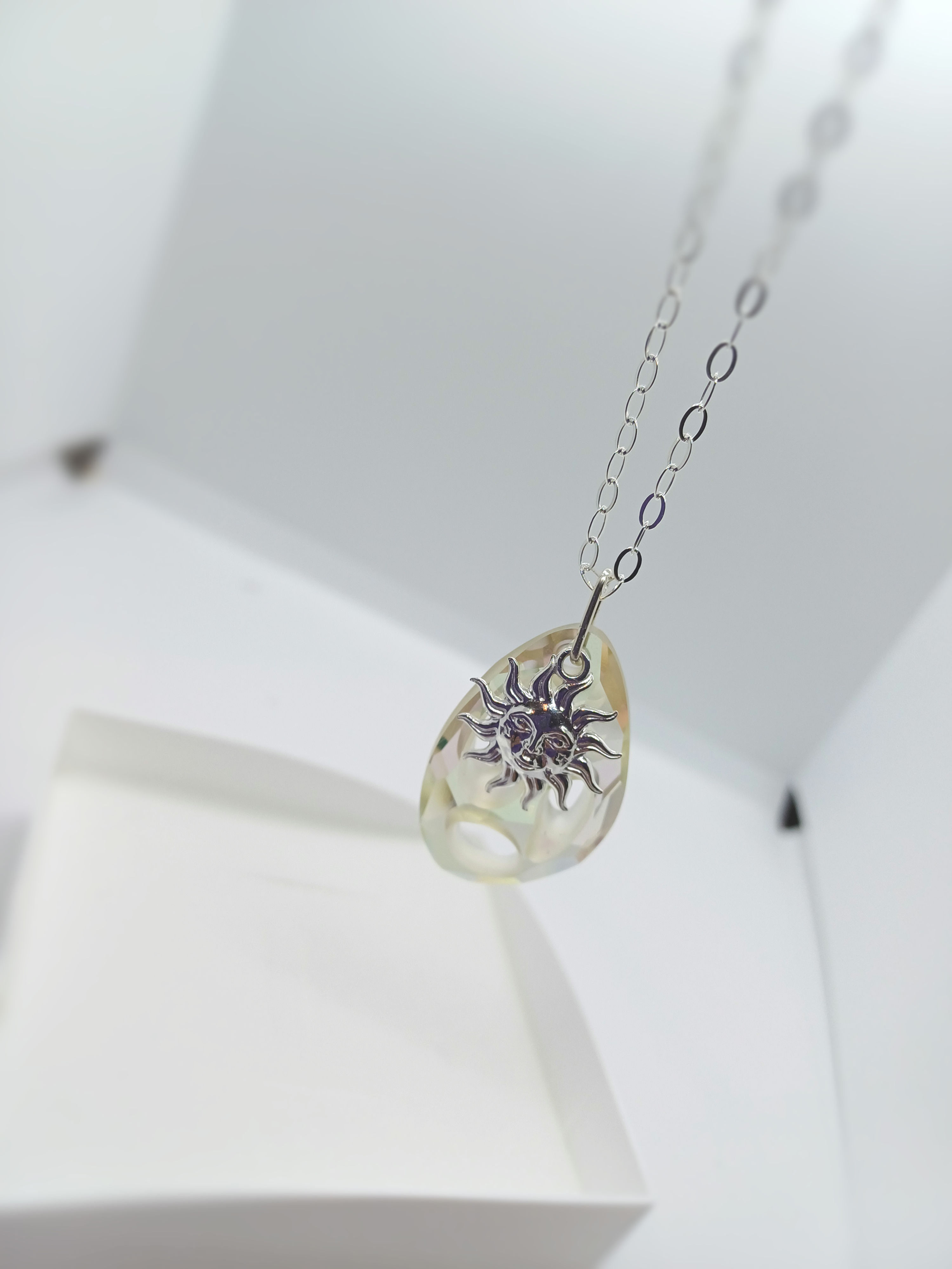 Austrian crystal and sterling silver sun pendant.