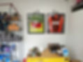 Bike Shop wall with framed biking jerseys