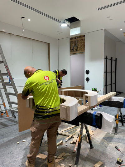 LFCS Carpenter working on a column fixture