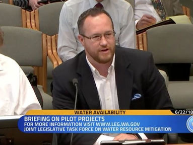 Yelm City Administrator, Michael Grayum, helps to facilitate water pilot program