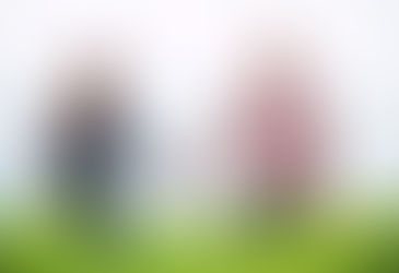 A happy couple taking a walk and holding hands