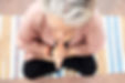 Theresa half lotus yoga pose close up Rishikesh.jpg