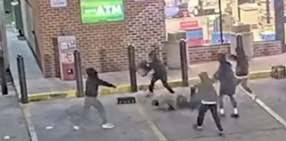 Baltimore police hunt suspects caught on video attacking 74-year-old man outside 7-Eleven