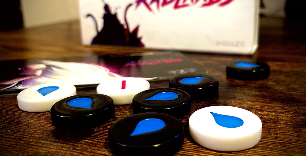 The Radlands box in the background and Water tokens in the foreground