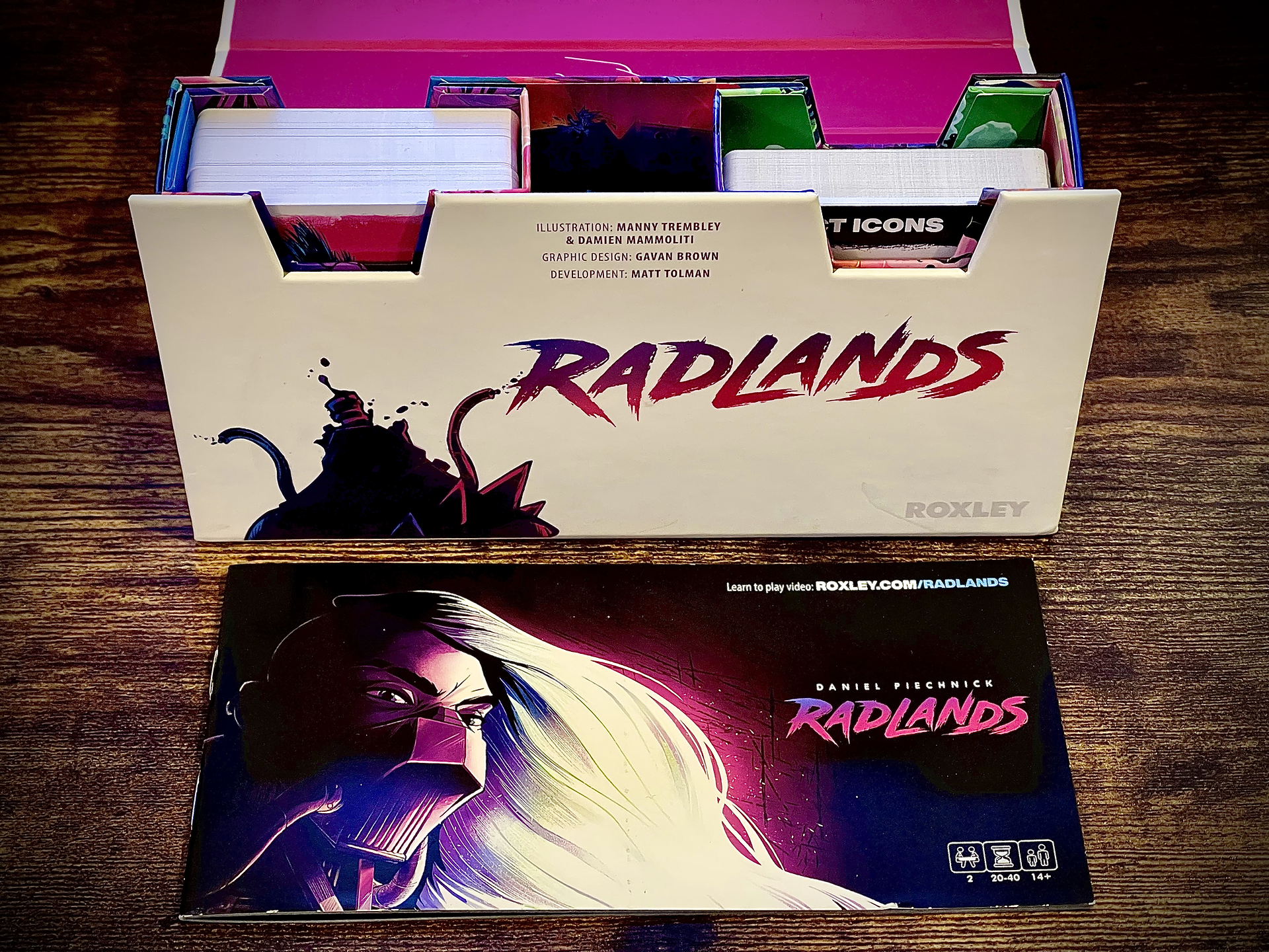A close up of the inside of the Radlands box with cards inside