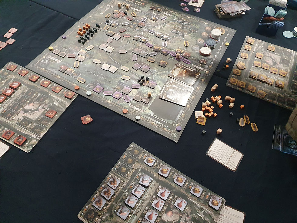 A game of Brass Birmingham in play. It has various boards including the central game board. Airecon Brass Birmingham - Katenic - March 2023