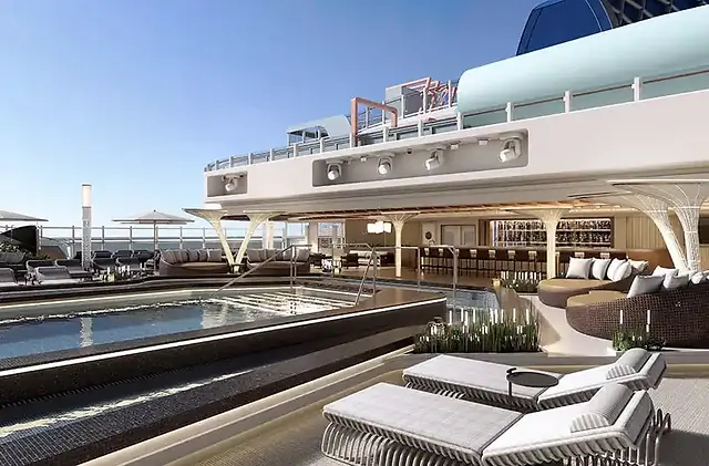 An outdoor pool deck with couches.