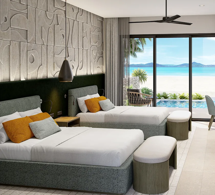 Two beds sit in a room, with footstools. A pool is outside their sliding-door and it has a view of the ocean.