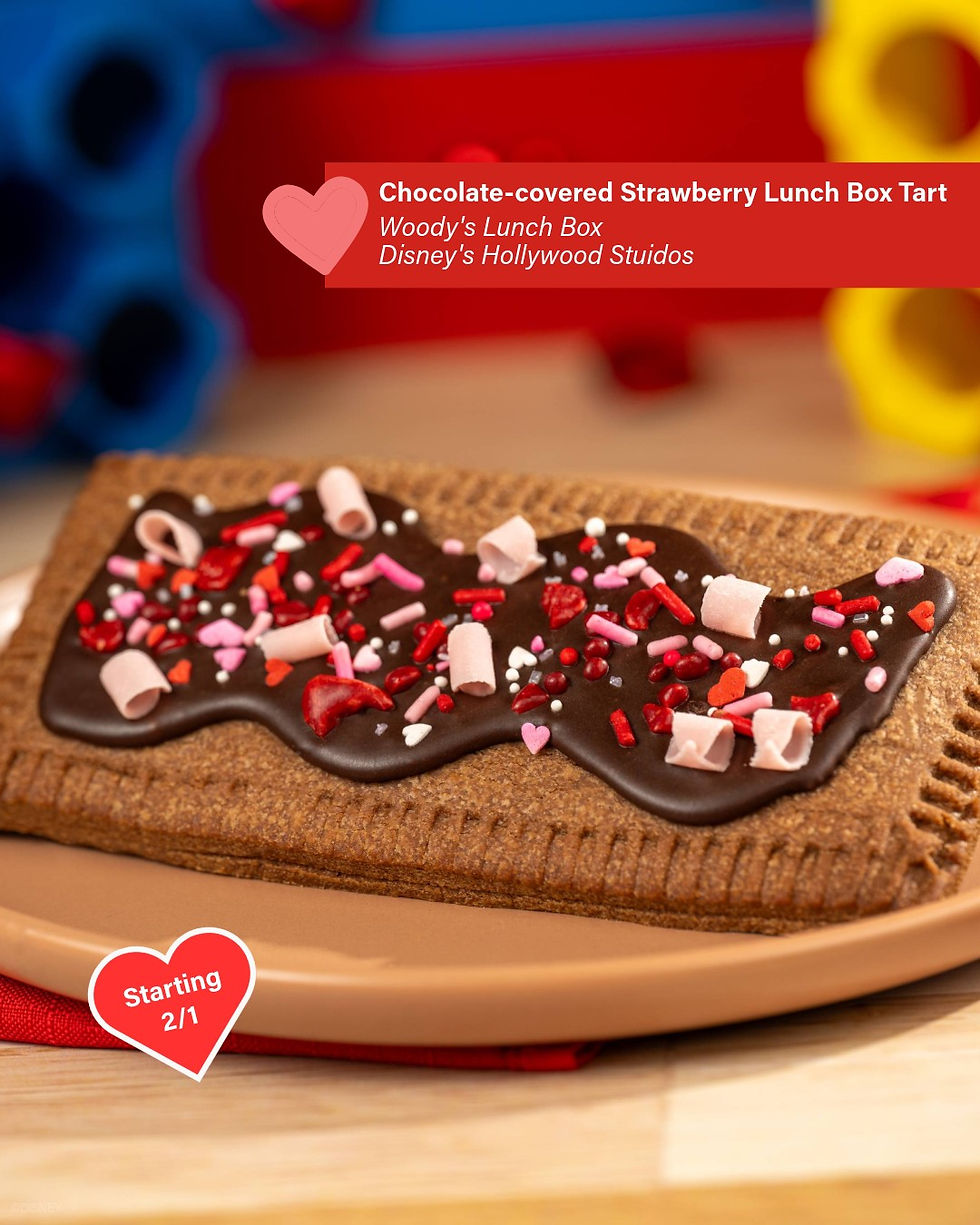 Chocolate-covered tart with sprinkles on a plate. Text: "Chocolate-covered Strawberry Lunch Box Tart, Woody's Lunch Box, Disney's Hollywood Studios."