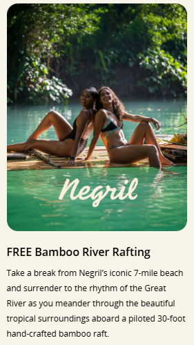 Two women on a raft, in green waters, smiling.