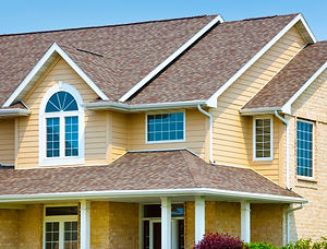house-with-brick-architectural-vinyl-siding-asphalt-shingle-roof-168518506-584092dc3df78c0