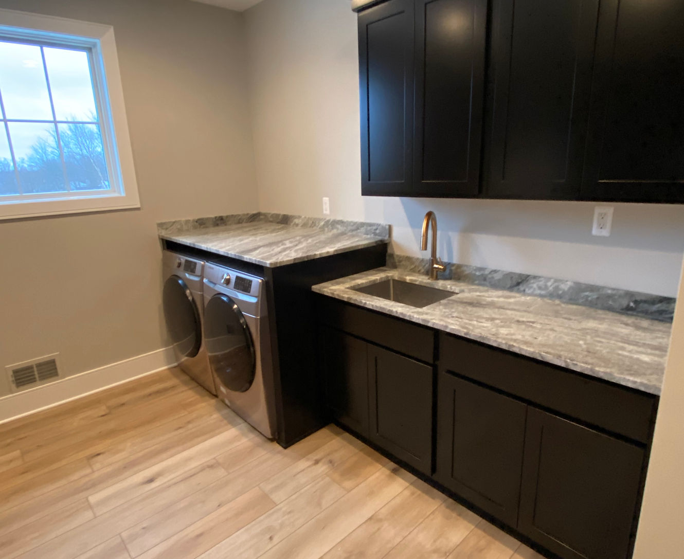 Stunning 2,590 sq. ft. home in Michigan with 3 bedrooms, 2.5 baths, a designer kitchen, and a three-car attached garage