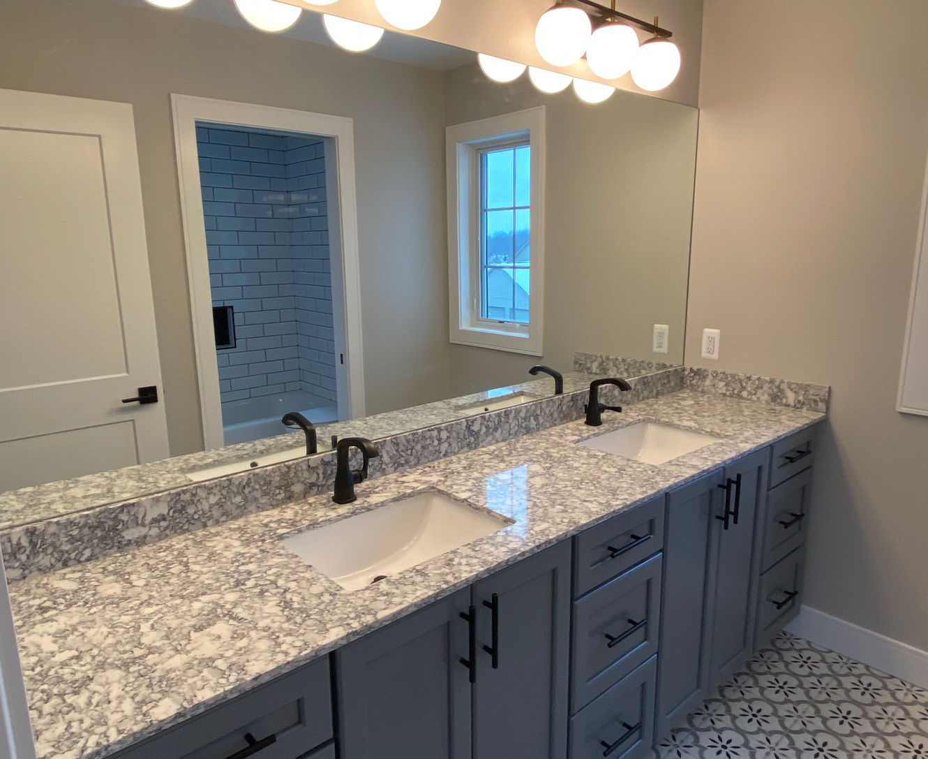 Stunning 2,590 sq. ft. home in Michigan with 3 bedrooms, 2.5 baths, a designer kitchen, and a three-car attached garage