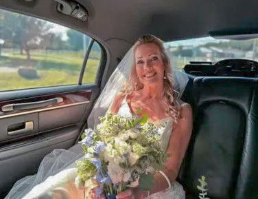 A customer submitted photo from a Summer Wedding in one of our Stretch Limousines.