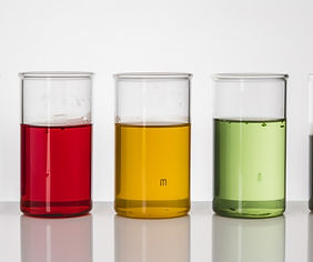 vecteezy_row-of-beakers-with-different-colors-in-it-ai-generated_24493413_708.jpg