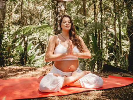 A pregnant woman meditating
