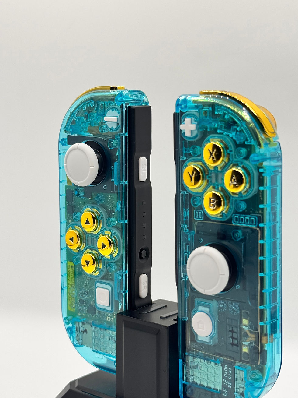 Thumbnail: Nintendo Switch Clear Blue Reshelled Joy-Cons golden buttons