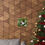 Thumbnail: Rabbit picture on wall with Christmas tree next to a wooden background.