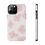 Thumbnail: White phone case with pink flower pattern, side view showing design details.