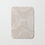 Thumbnail: Beige bath mat with textured marble pattern for elegant bathroom decor