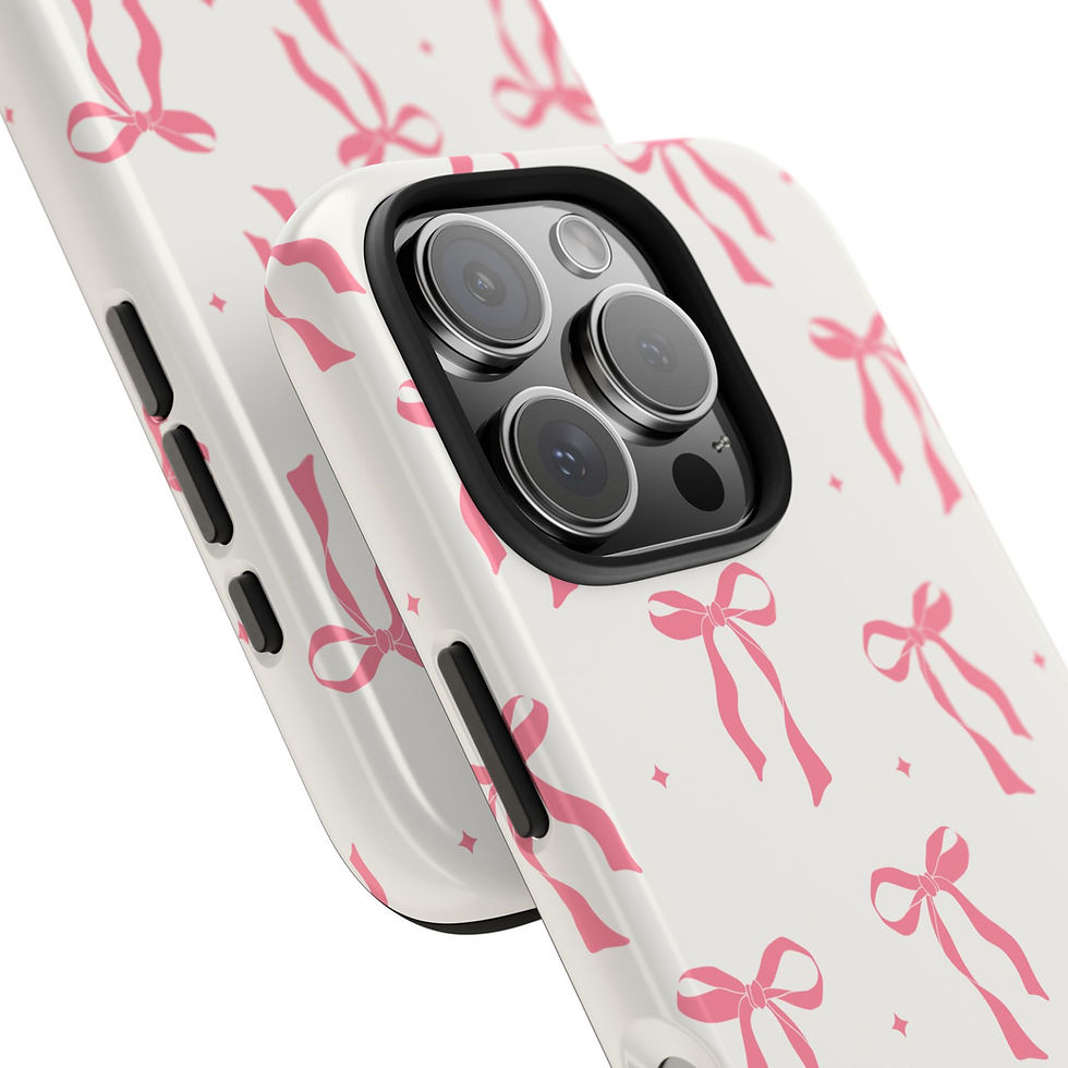 Thumbnail: White iPhone cases with pink ribbon design, close up view with details.