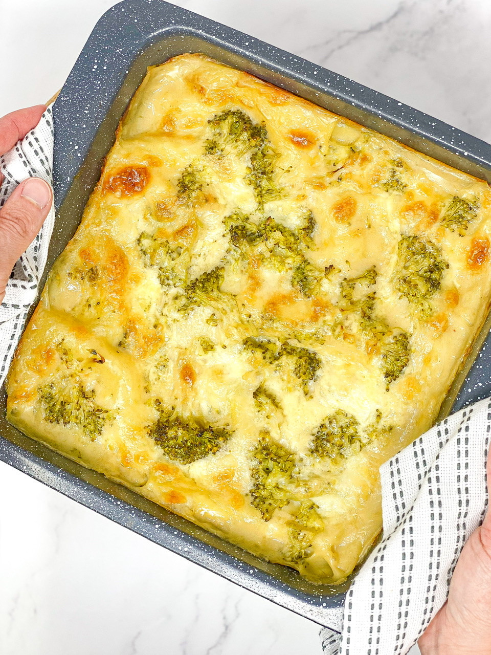 BROCCOLI LASAGNE melted cheese with fork blw food