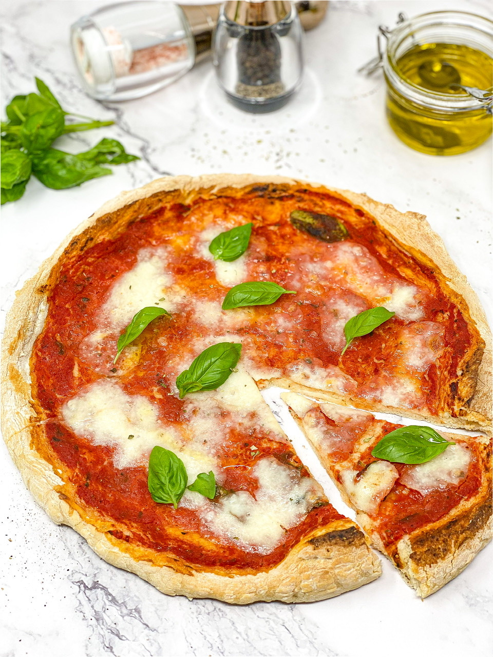 HOMEMADE PIZZA with basil