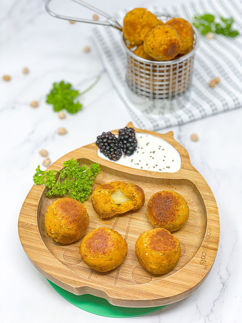 CHEESY CHICKPEAS CARROT BITES on eco rascals plate ladybird