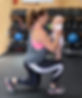Woman lunging, holding baby: Energised Ladies fitness