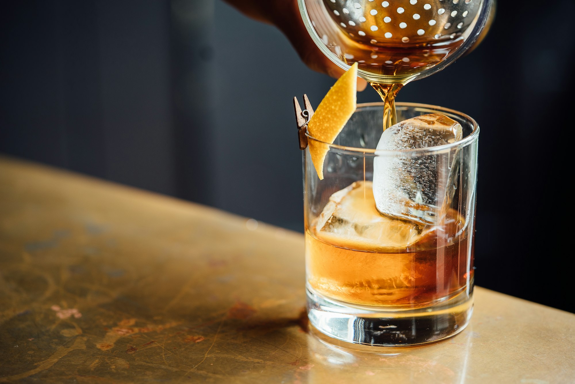 Bartender pouring cocktails