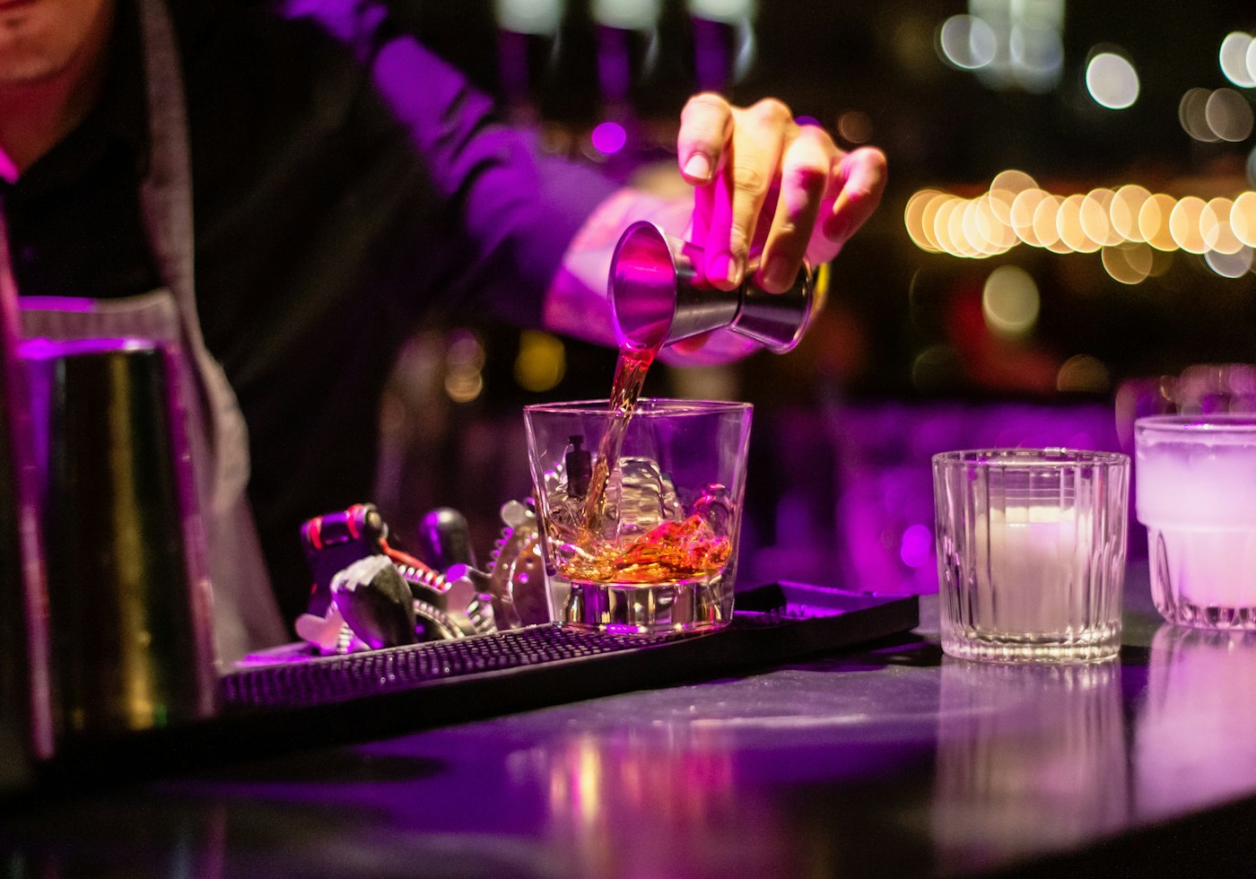 Bartender pouring a drink