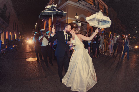 Brian stops the second line dance to kiss Jessica while their guests gather themselves to leave Latrobe's for the next location - Julia Bailey