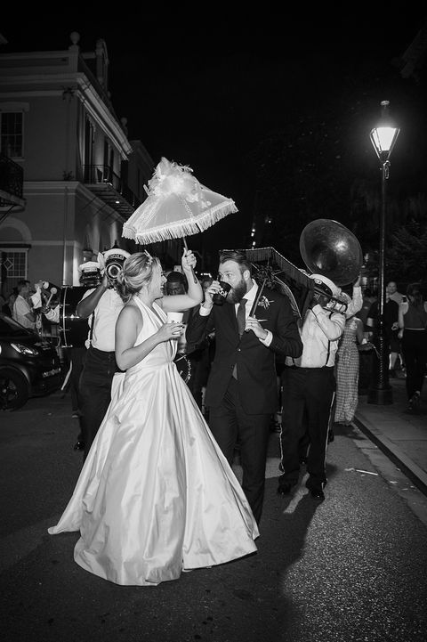 Brian stops to have a drink during his second line which makes his wife Jessica laugh - Julia Bailey