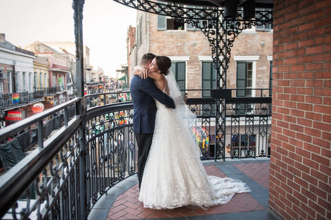 a soon to be married couple embraces during their first look, the bride smiles broadly with joy - Julia Bailey