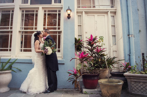 Darrel kisses his bride Jennifer and holds her tenderly during their first look - Julia Bailey