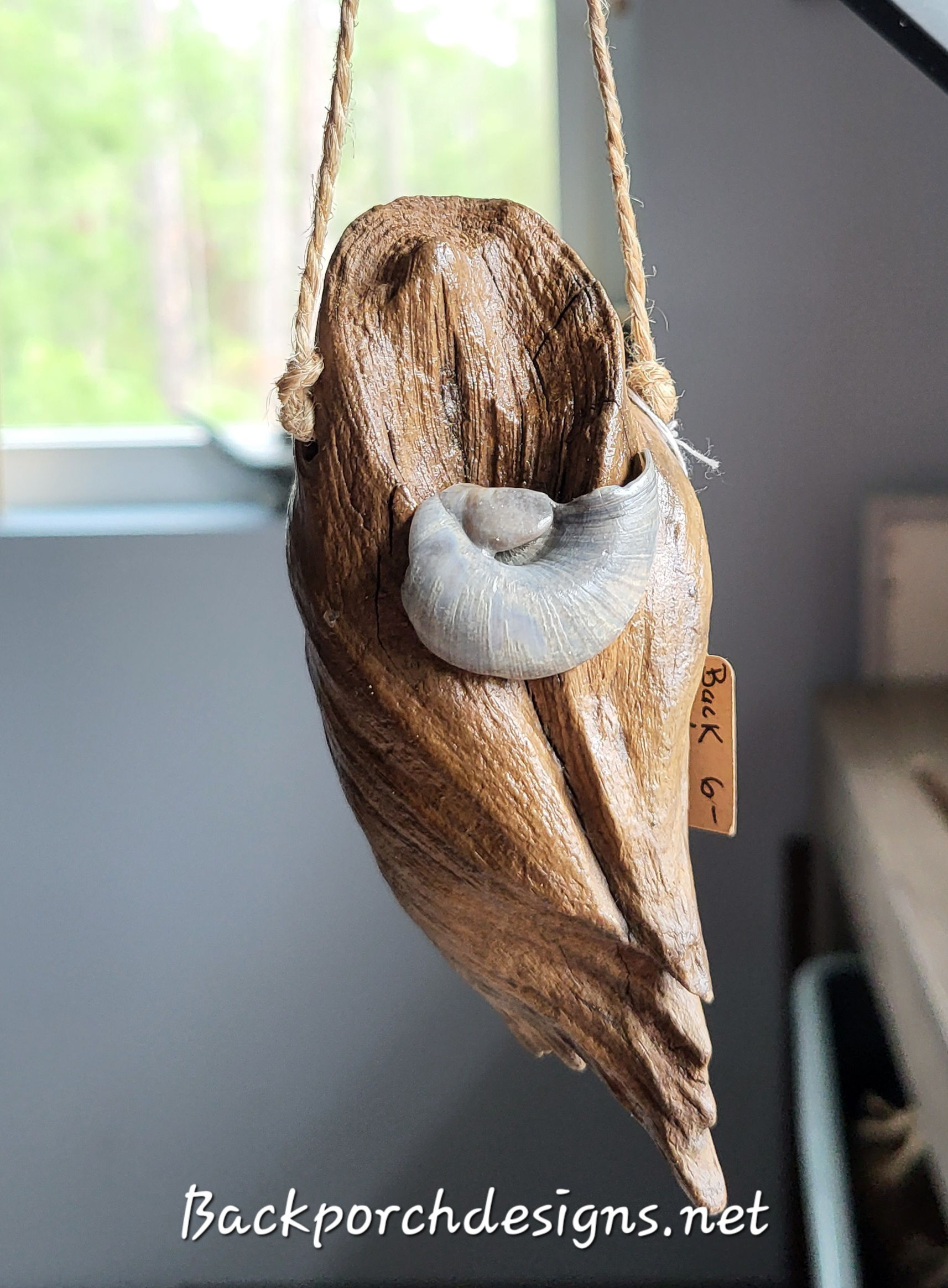 Handmade Driftwood coastal ornament with shell accent