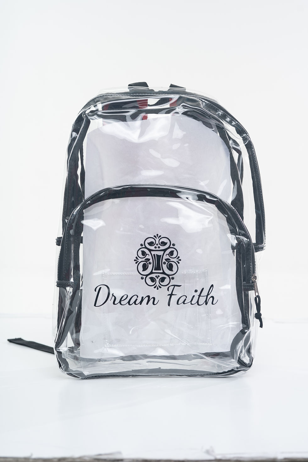 Thumbnail: Clear Backpack colors: Red, Turqouise, and Black