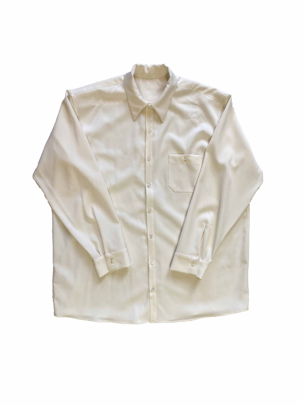 Thumbnail: Oversized workwear shirt in ivory wool, with chest patch pocket, straight hem, and front button placket. 100% Wool. Made in E