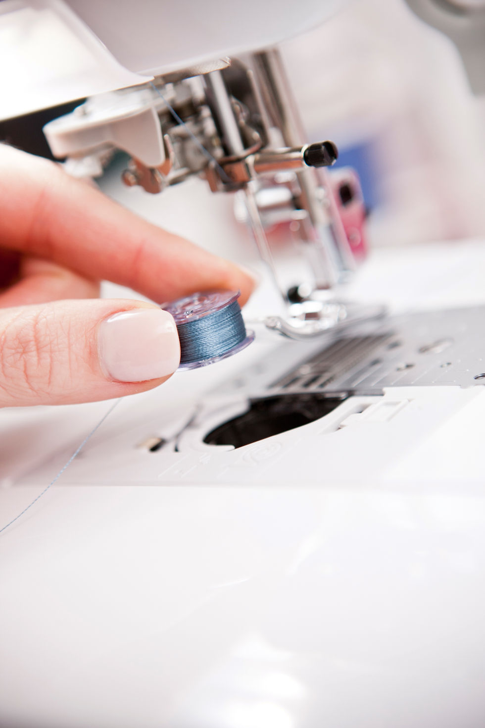 Thumbnail: Putting bobbin in the easy set drop in system on Brother VQ2 sewing and quilting machine.