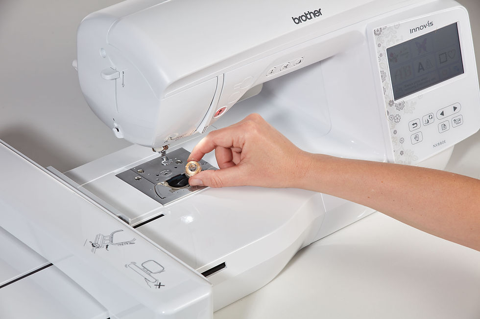 Thumbnail: Putting a drop in bobbin into the Innovis NV880E embroidery machine