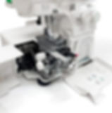 janome800d overlocker with the front open for threading