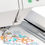 Thumbnail: close up of floral embroidery on janome embroidery 550e machine.